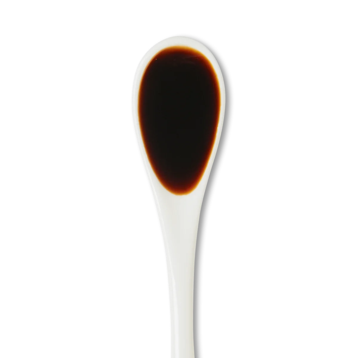 A white spoon filled with a dark brown liquid, likely soy sauce, against a white background.