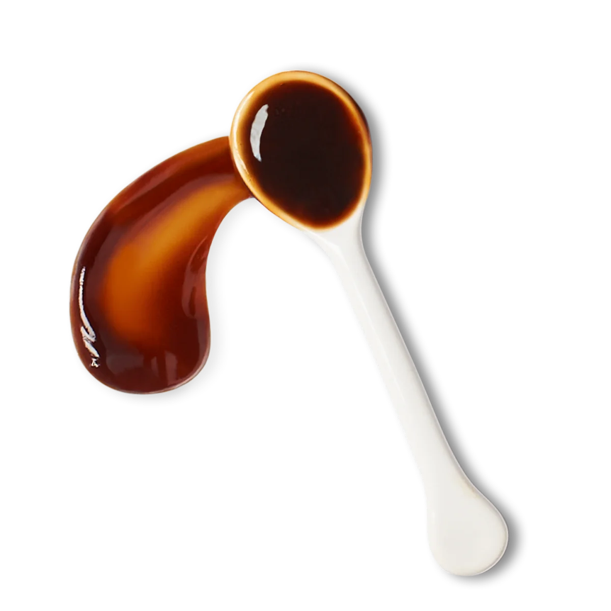 A white spoon filled with dark brown liquid sauce, with some sauce spilled beside the spoon on a white background.