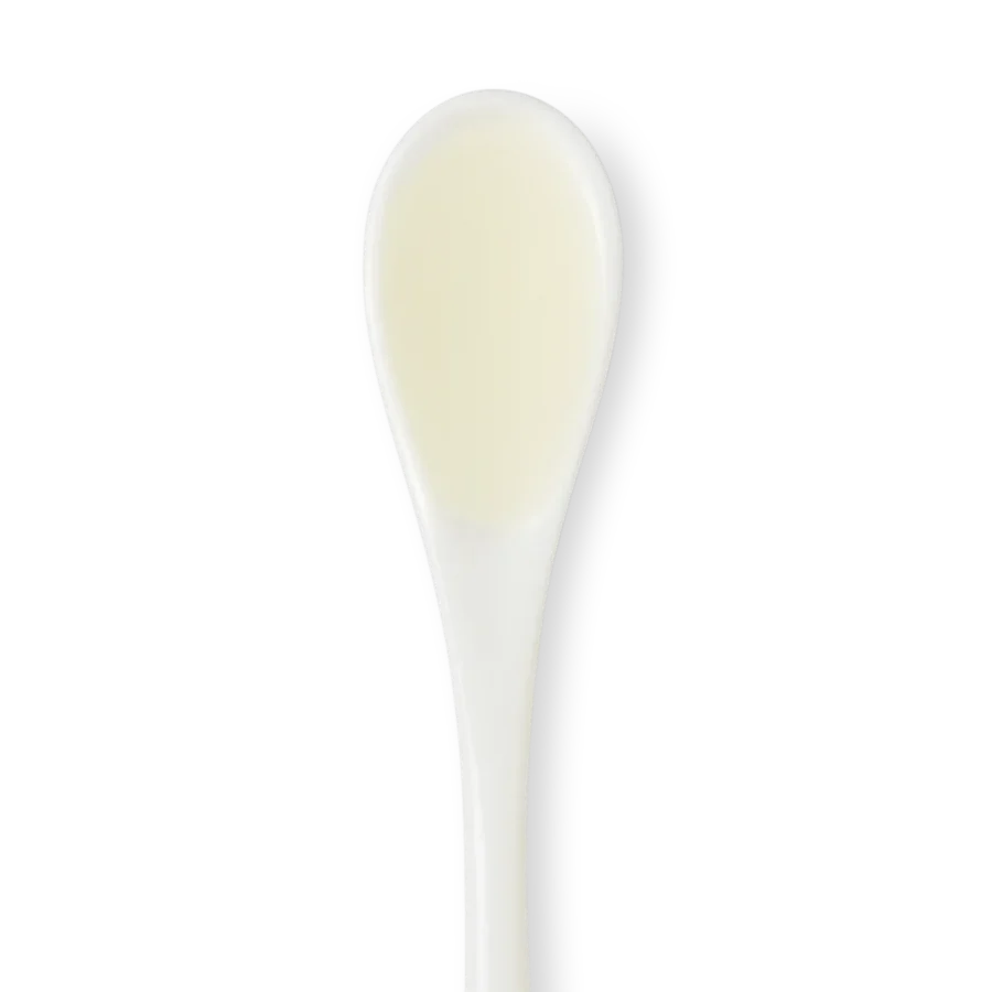 A white plastic spoon displayed against a plain white background.