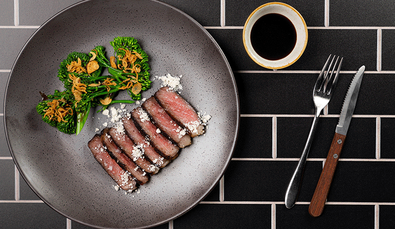 Image for Porcini Rubbed Dry Aged Strip Steak with Sesame Miso Butter + Broccolini