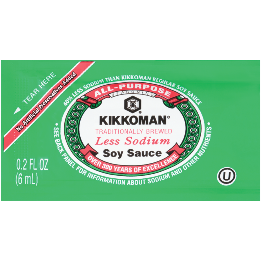 A green 0.2 fl oz packet of Kikkoman Traditionally Brewed Less Sodium Soy Sauce with product information and branding on the front.