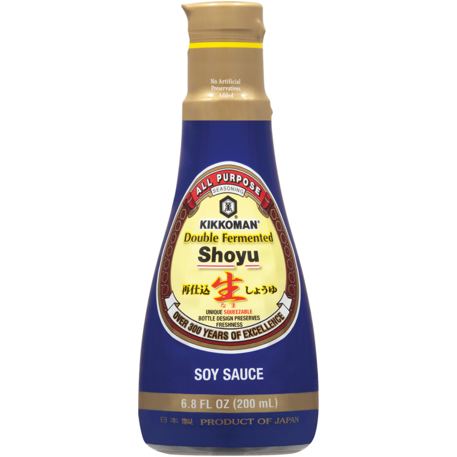 A 200 mL bottle of Kikkoman Double Fermented Shoyu soy sauce with a blue and gold label, featuring product details and claims of over 300 years of excellence.