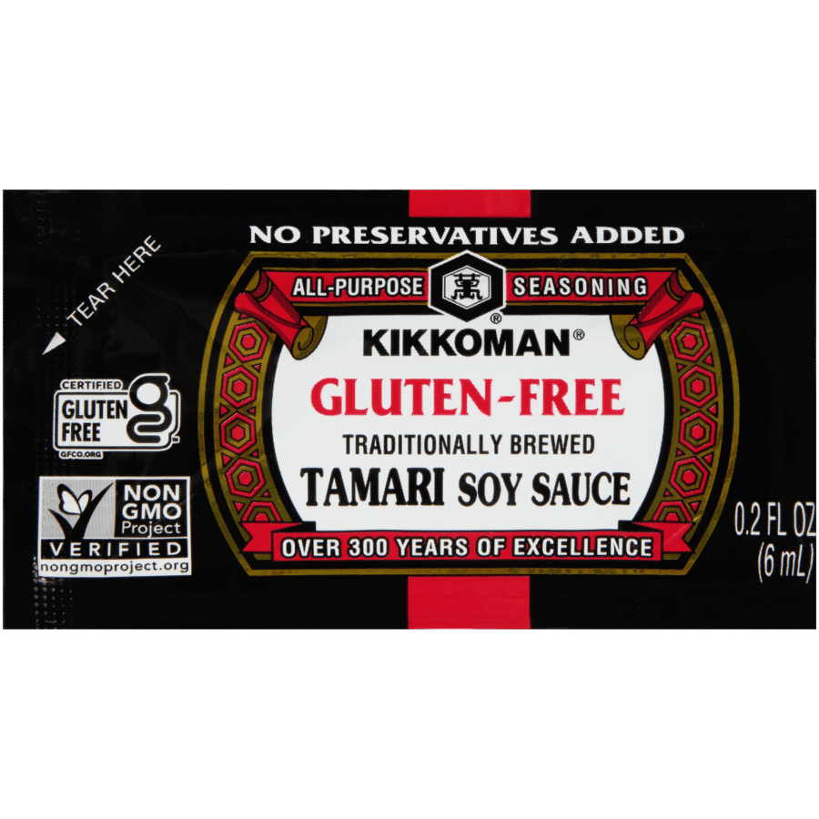 A Kikkoman gluten-free tamari soy sauce packet, labeled as non-GMO and containing 0.2 fl oz (6 mL), with "no preservatives added" stated at the top.
