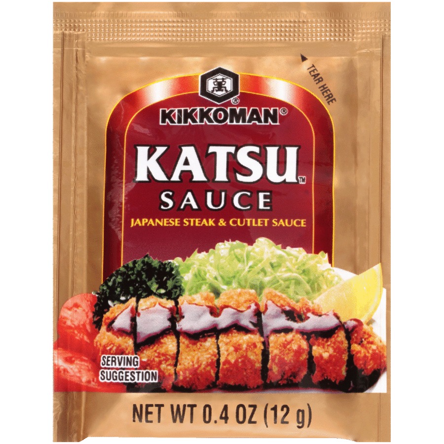 A gold packet of Kikkoman Katsu Sauce labeled "Japanese Steak & Cutlet Sauce," with an image of breaded cutlet, sauce, vegetables, and lemon slice. Net weight is 0.4 oz (12g).