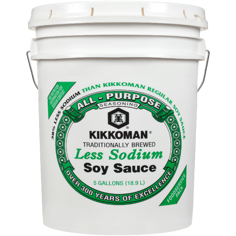 A white 5-gallon bucket of Kikkoman All-Purpose Less Sodium Soy Sauce with green and black labeling and a metal handle.