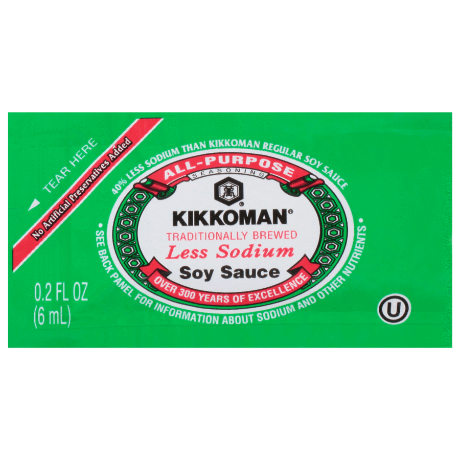 A green packet of Kikkoman Less Sodium Soy Sauce, 0.2 fl oz (6 mL), labeled "Traditionally Brewed" and "No Artificial Preservatives Added.