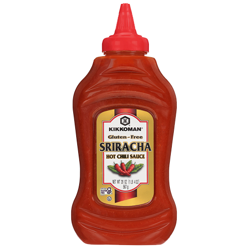 A plastic squeeze bottle of Kikkoman Gluten-Free Sriracha Hot Chili Sauce with a red cap and yellow label.