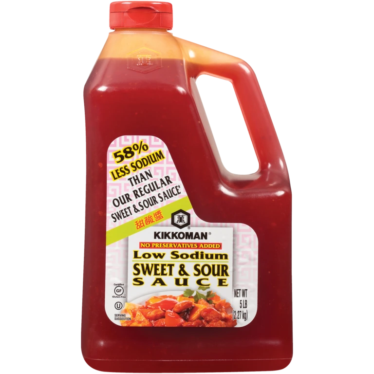 A 5 lb jug of Kikkoman Low Sodium Sweet & Sour Sauce with a handle and label highlighting 58% less sodium than regular sweet & sour sauce.
