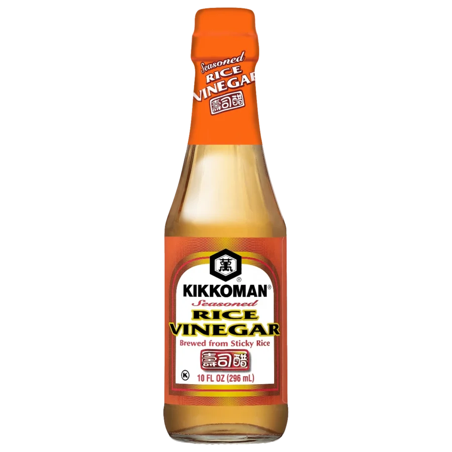 A 10 fl oz bottle of Kikkoman Seasoned Rice Vinegar with an orange cap and label, indicating it is brewed from sticky rice.