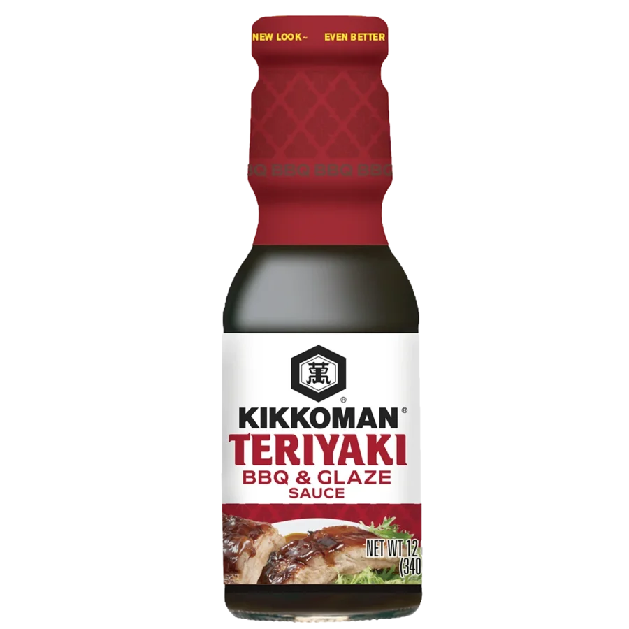 A bottle of Kikkoman Teriyaki BBQ & Glaze Sauce with a red cap and label, showing grilled meat and vegetables on the front.