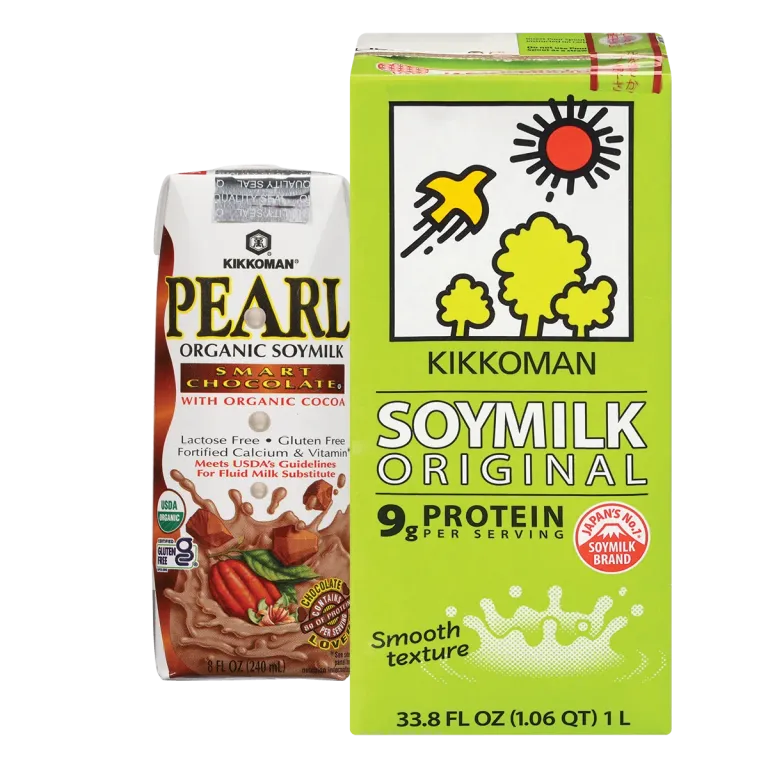 Two cartons of Kikkoman soy milk: one is organic chocolate flavored, the other is original flavor with a green design and both have product information on the front.