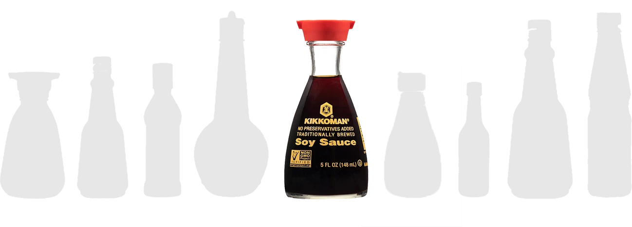 A clear glass bottle of Kikkoman soy sauce with a red cap is centered, surrounded by the silhouettes of other sauce bottles in the background.