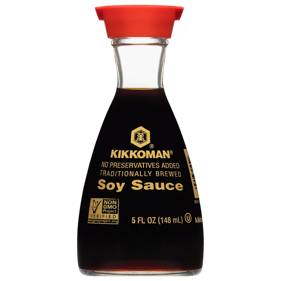 A glass bottle of Kikkoman soy sauce with a red cap, labeled "No preservatives added" and "Traditionally brewed," containing 5 fl oz (148 mL).