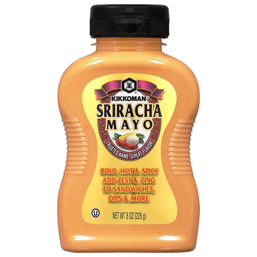 A bottle of Kikkoman Sriracha Mayo, 8 oz, with a yellow label describing it as bold, hot and spicy, for sandwiches, dips, and more.