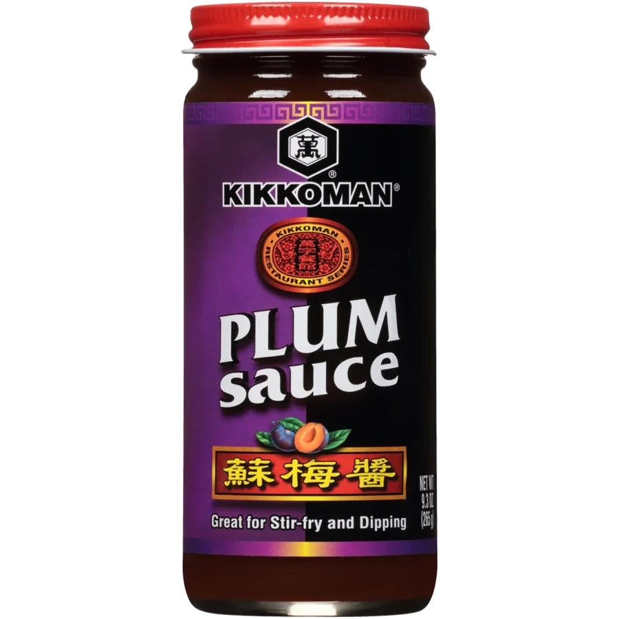 A jar of Kikkoman Plum Sauce with a purple label, showing the product name, an image of plums, and text stating it is great for stir-fry and dipping.