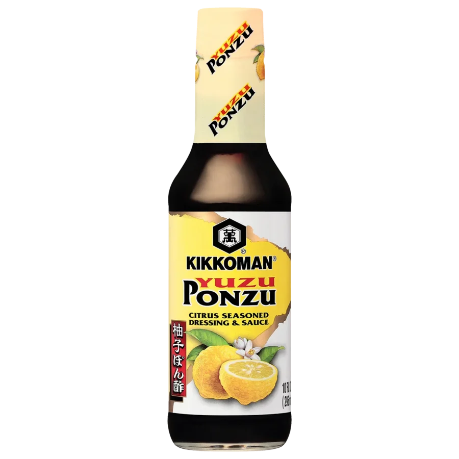 A bottle of Kikkoman Yuzu Ponzu citrus seasoned dressing and sauce with images of yuzu fruit on the label.