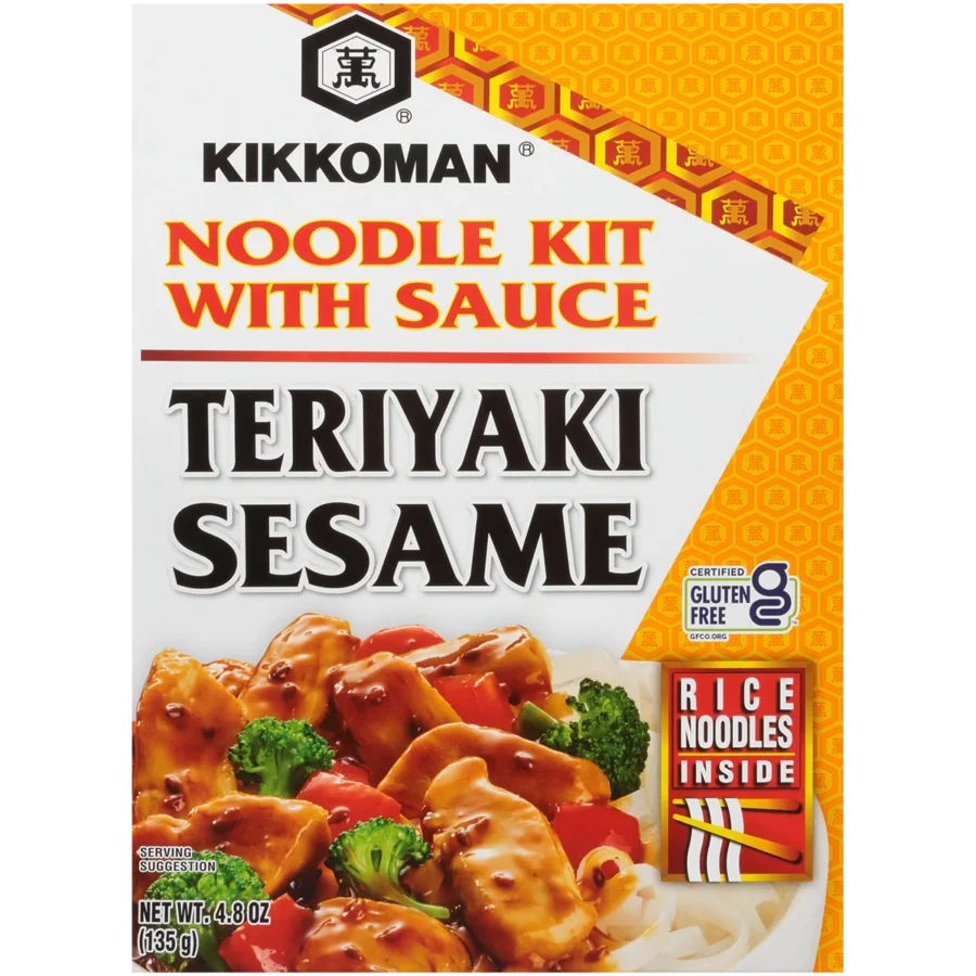 Front of a Kikkoman Teriyaki Sesame Noodle Kit with Sauce box, featuring images of chicken, vegetables, and rice noodles, plus gluten-free and rice noodle labels.