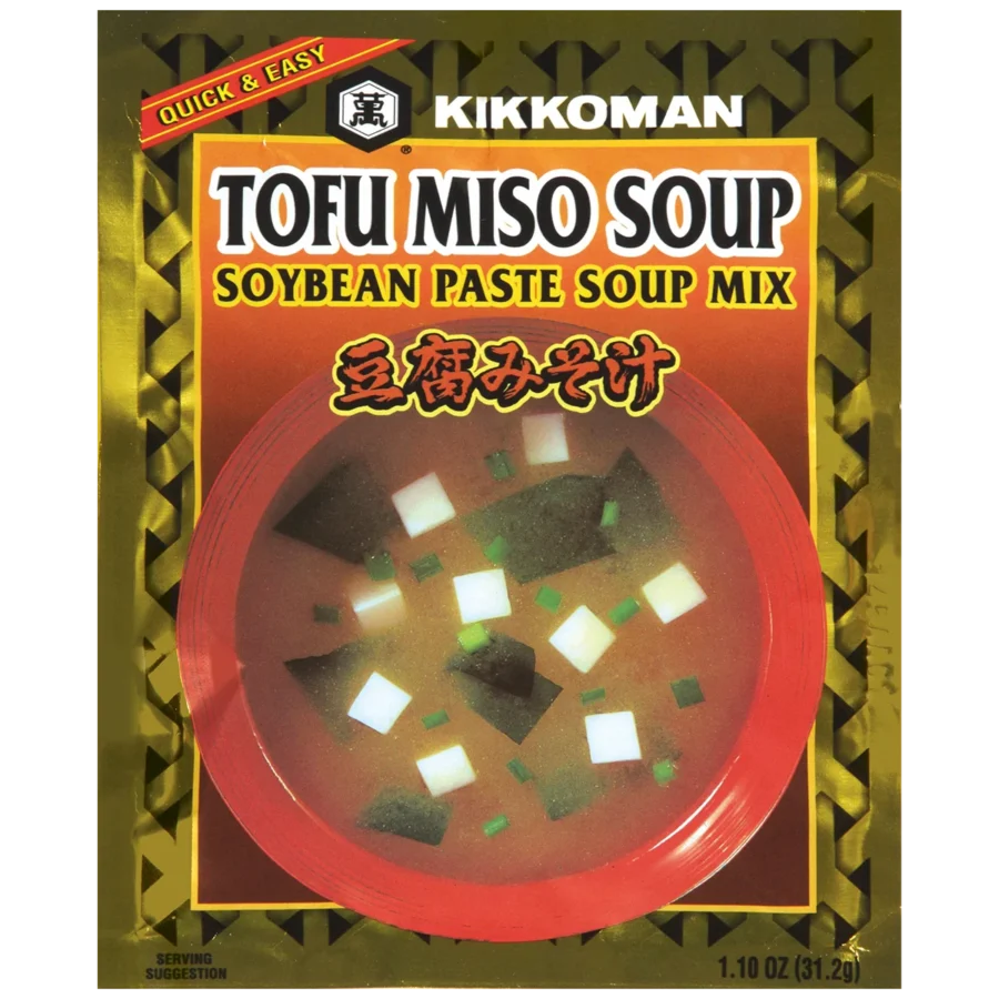 A package of Kikkoman Tofu Miso Soup Soybean Paste Soup Mix with an image of miso soup containing tofu cubes and seaweed on the front.