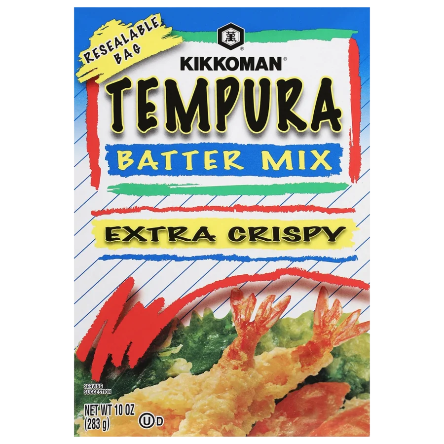 Front of a Kikkoman Tempura Batter Mix box labeled "Extra Crispy" with images of fried shrimp and vegetables. Net weight is 10 oz (283 g).