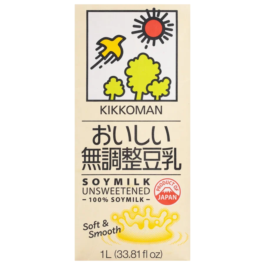 Carton of Kikkoman unsweetened soy milk, 1L, featuring a sun, tree, and bird illustration, with Japanese and English text and a red "Product of Japan" label.
